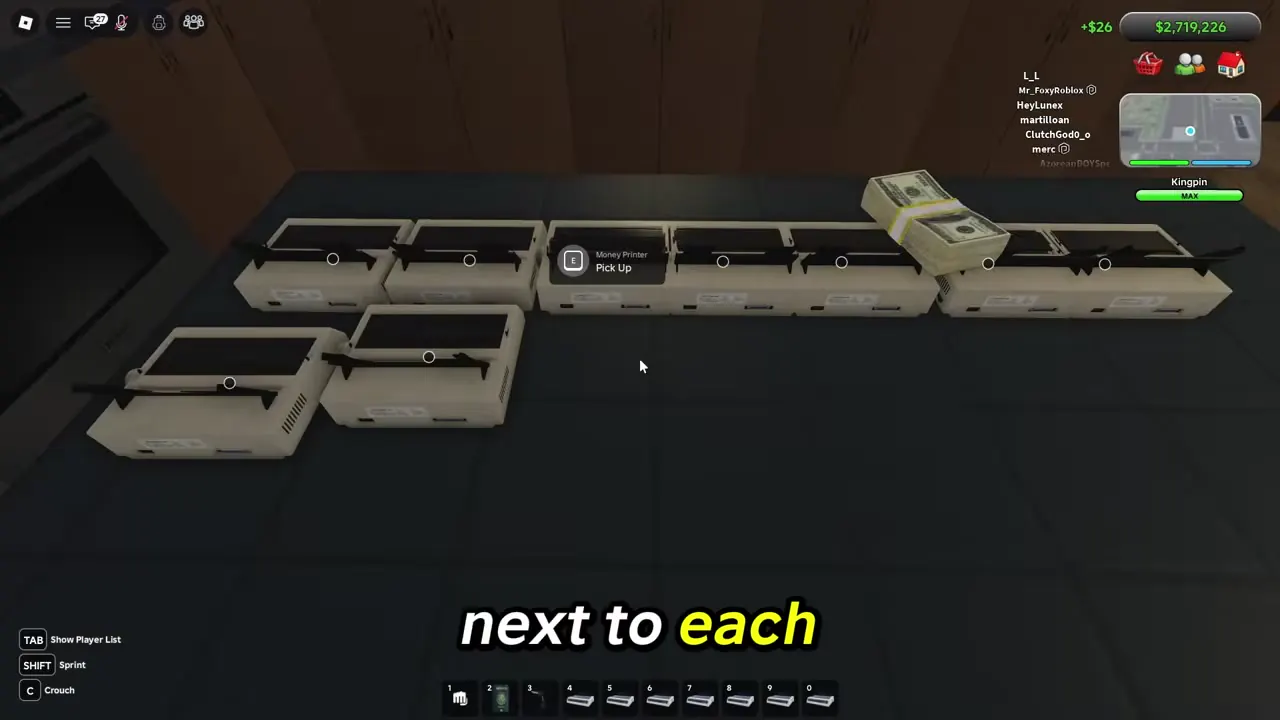 A row of money printers placed inside a San Diego Border Roleplay apartment